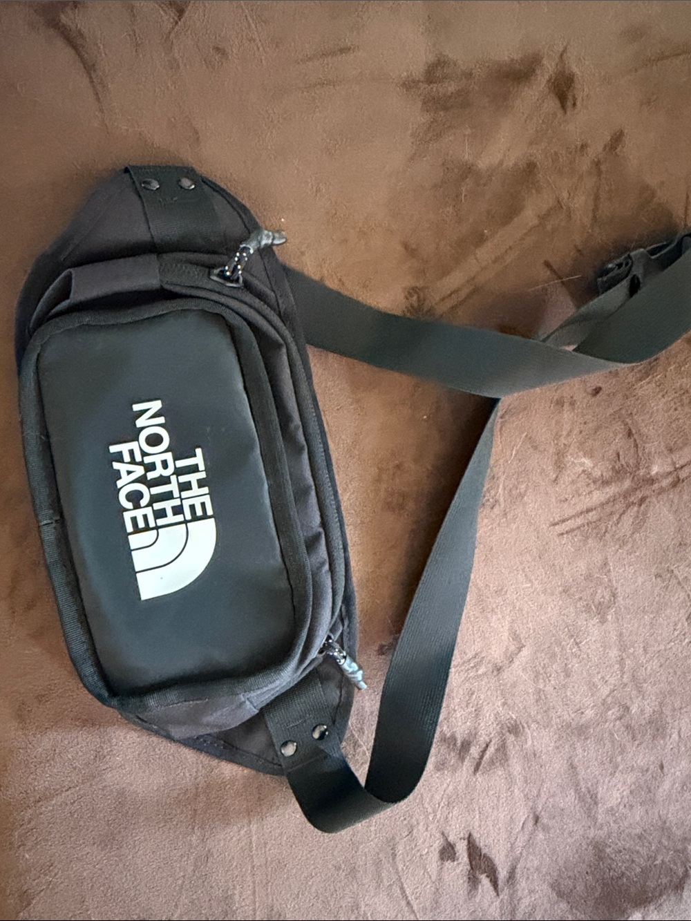 The North Face Black Waist Sling Bag with White Logo